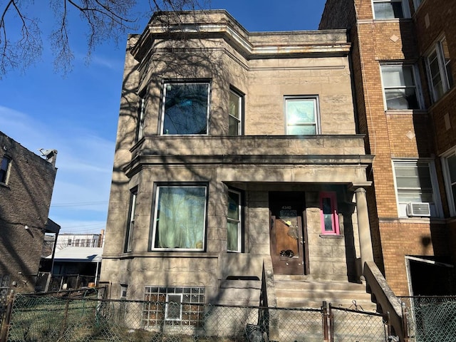 view of front of property with cooling unit