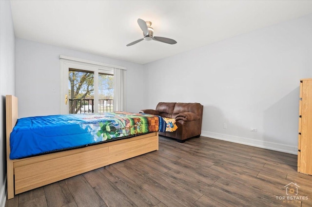 bedroom featuring access to exterior, ceiling fan, and dark hardwood / wood-style flooring