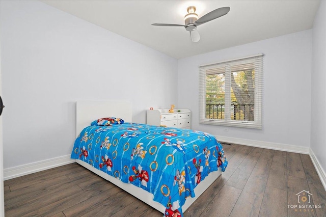 bedroom featuring ceiling fan and dark hardwood / wood-style flooring