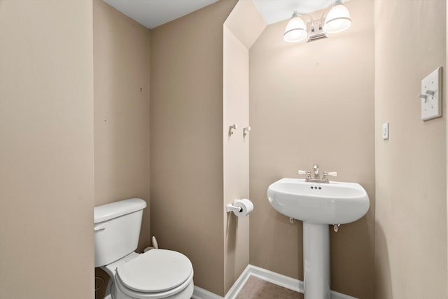 bathroom with sink and toilet