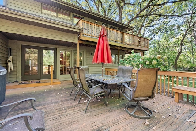 wooden deck featuring french doors