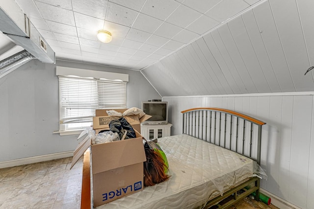 bedroom featuring vaulted ceiling