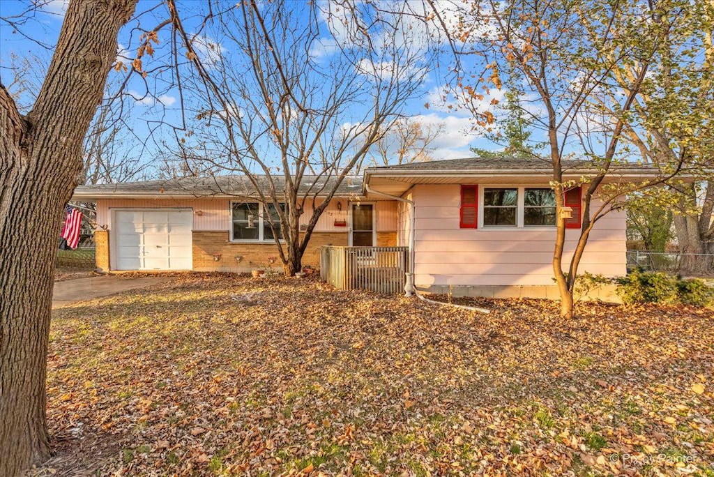 ranch-style home with a garage