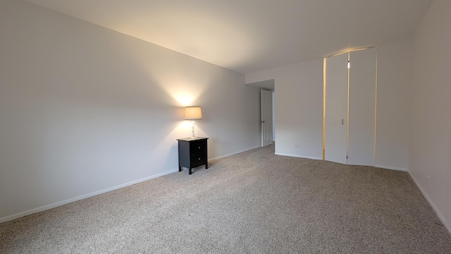 spare room with carpet flooring