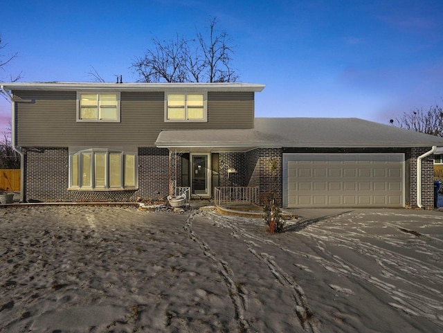 view of front of property featuring a garage