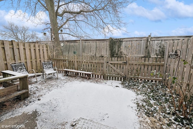 view of yard covered in snow