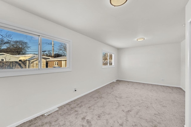 view of carpeted spare room