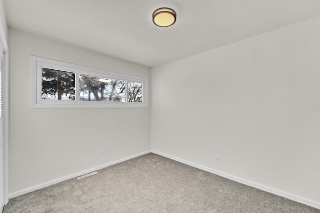 empty room with carpet floors