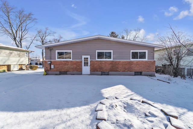 view of snow covered house