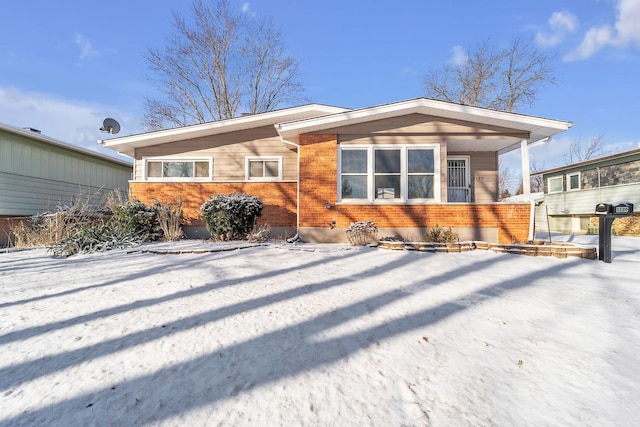 view of snow covered property