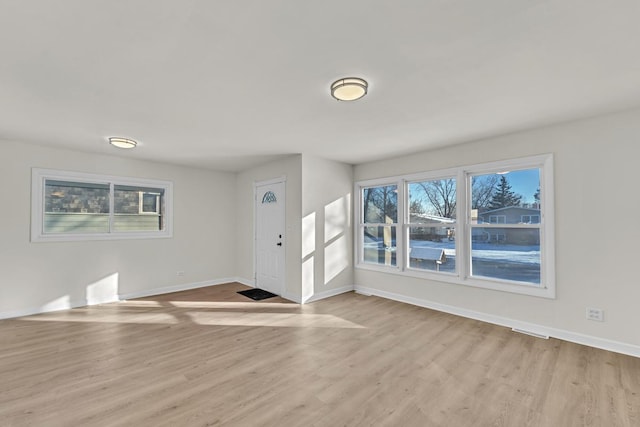 foyer entrance featuring light wood-type flooring