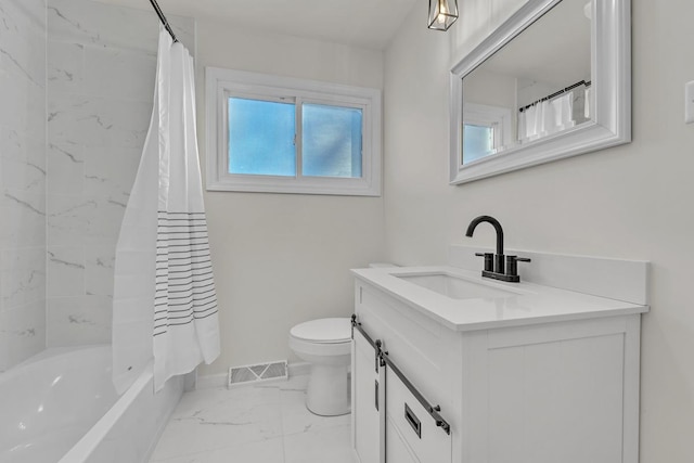 full bathroom featuring vanity, toilet, and shower / tub combo with curtain