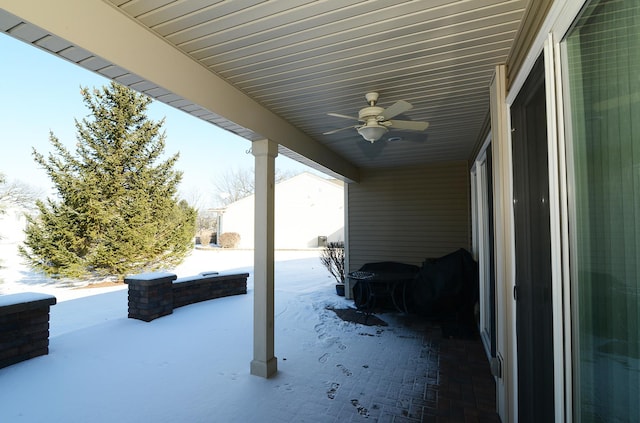 view of patio featuring ceiling fan