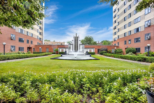 view of community featuring a yard