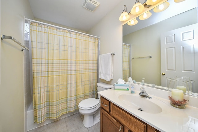 full bathroom featuring shower / bath combination with curtain, tile patterned floors, toilet, and vanity