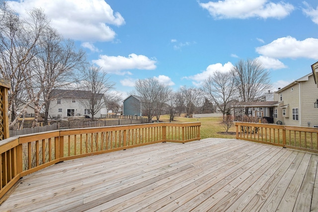 deck with a yard and a pergola