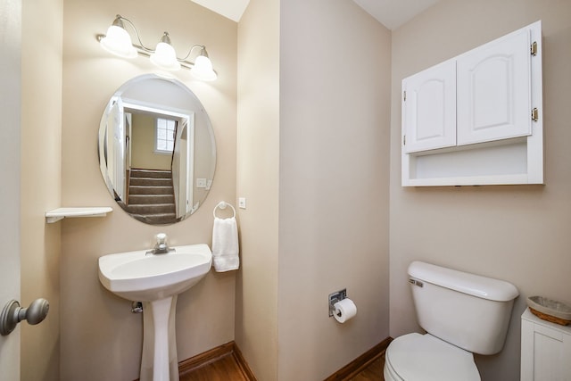 bathroom with sink and toilet