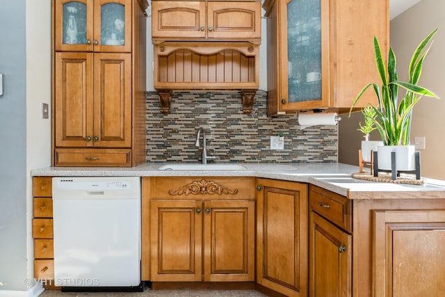 kitchen with sink, decorative backsplash, and dishwasher