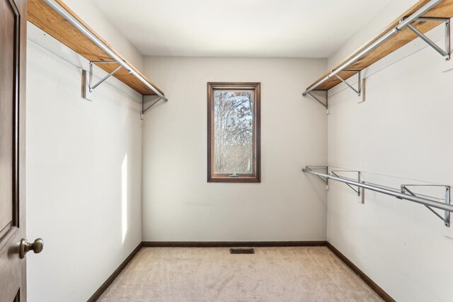 bathroom featuring tile patterned flooring and vanity