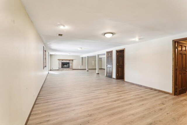 unfurnished living room with light hardwood / wood-style flooring