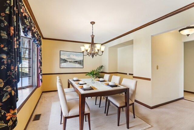 kitchen featuring pendant lighting, light tile patterned floors, stainless steel appliances, and a kitchen island