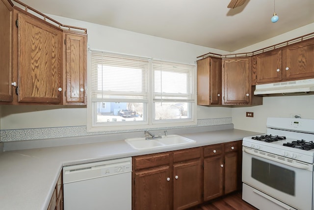 kitchen featuring sink, white appliances, and ceiling fan