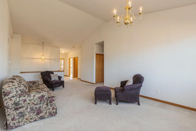 carpeted living room featuring high vaulted ceiling and a chandelier