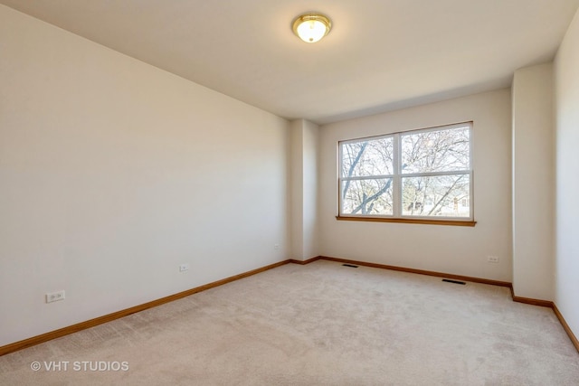 view of carpeted spare room