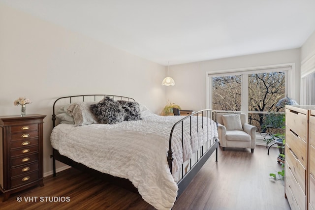 bedroom featuring dark hardwood / wood-style floors