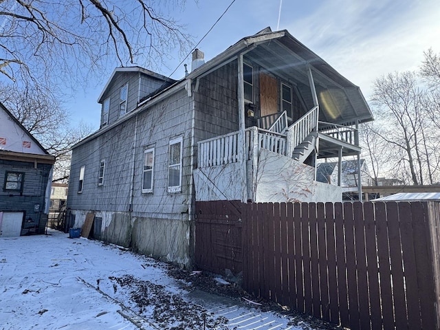 view of snow covered property