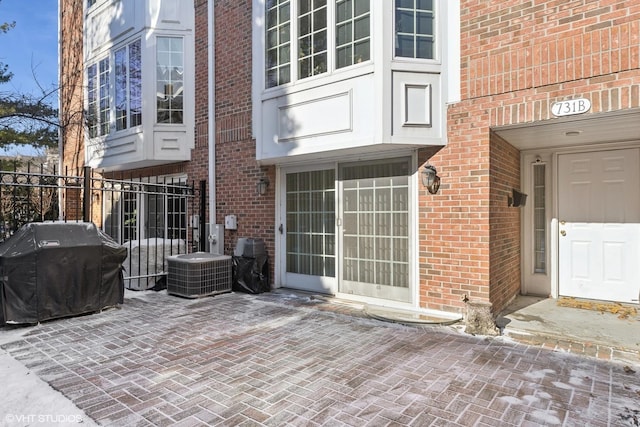 view of patio with a grill