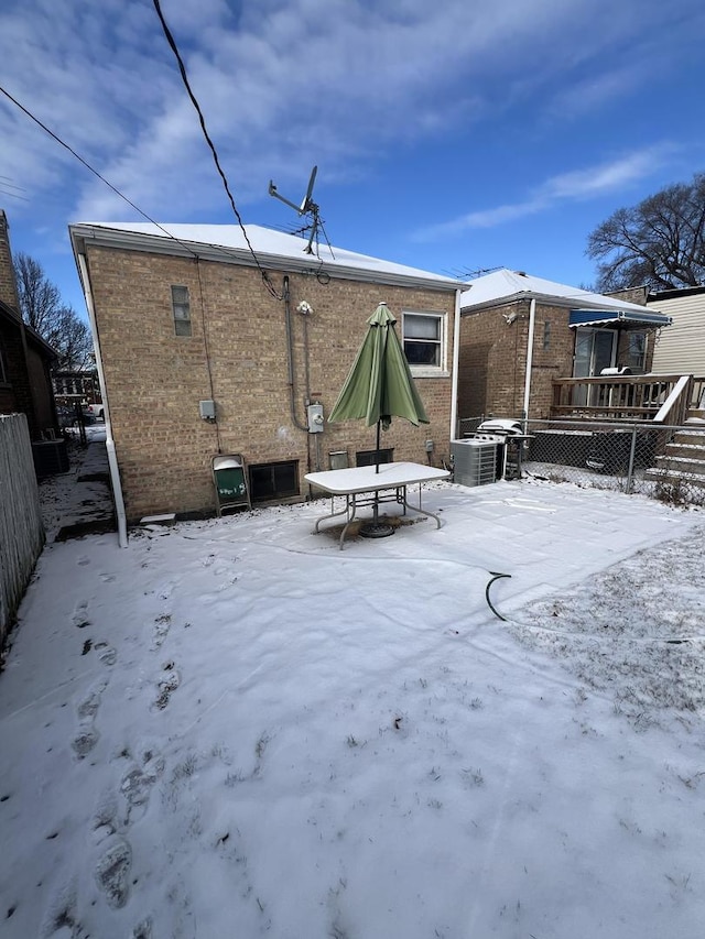 view of snow covered property