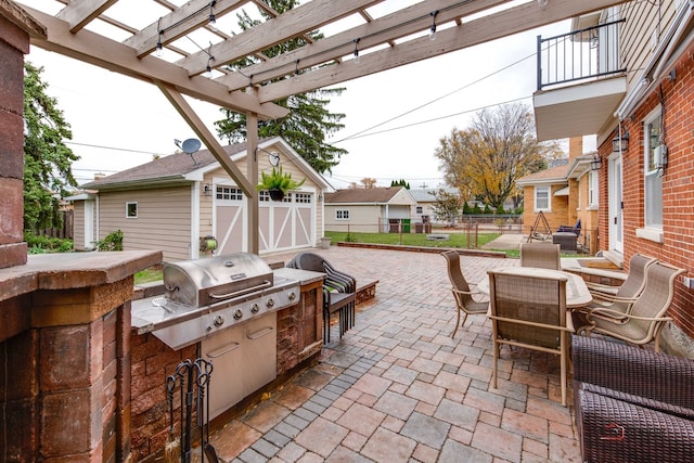 view of patio featuring a shed and a pergola