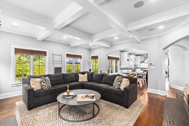 1210 Blackthorn Ln, Deerfield, IL 60015 - living room featuring arched walkways, beam ceiling, dark wood-type flooring, baseboards, and coffered ceiling