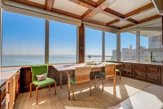 sunroom / solarium with beamed ceiling, a water view, and coffered ceiling