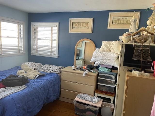 bedroom featuring dark hardwood / wood-style floors