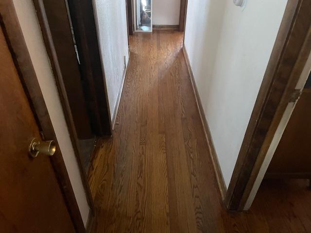 hall featuring dark hardwood / wood-style flooring