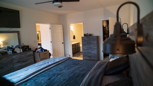 bedroom featuring connected bathroom and ceiling fan