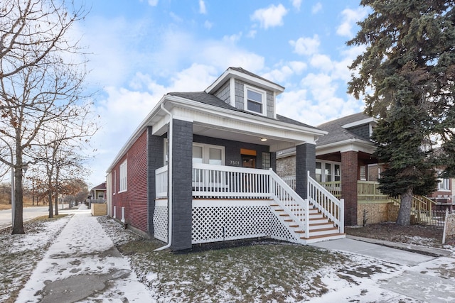 bungalow-style house featuring covered porch