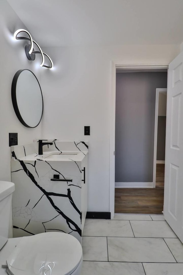 bathroom with sink and toilet