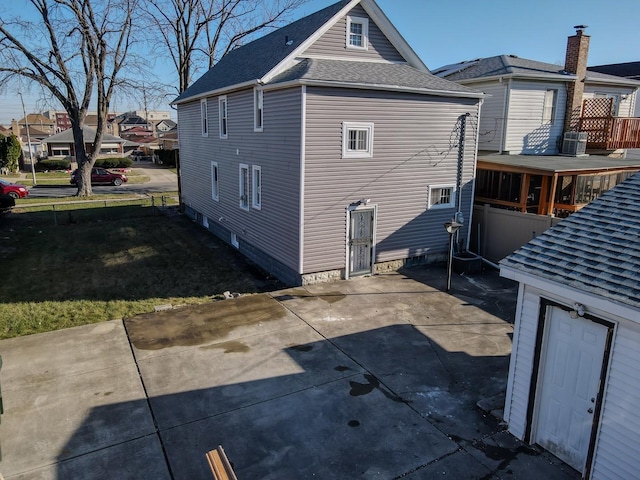 back of house featuring a patio area