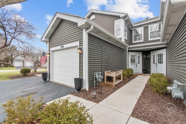 view of home's exterior featuring a garage