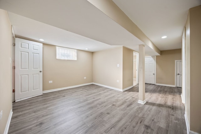 basement featuring light hardwood / wood-style floors