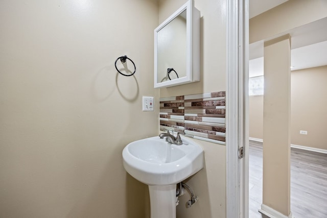 bathroom featuring wood-type flooring