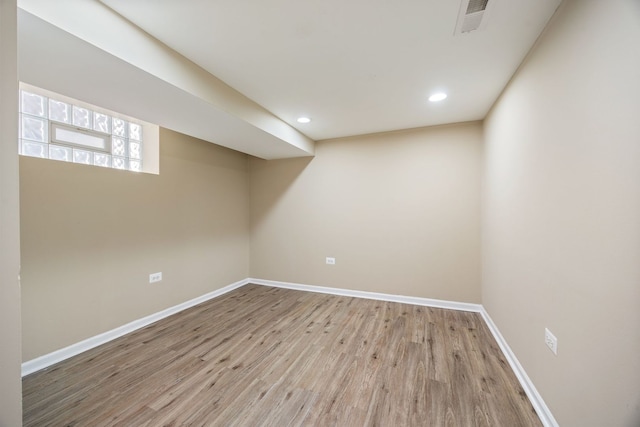 basement featuring light wood-type flooring