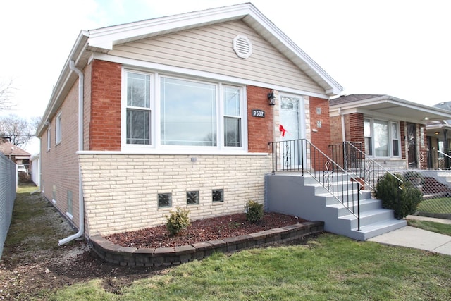 view of front facade with a front lawn