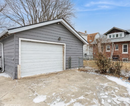 view of snow covered garage