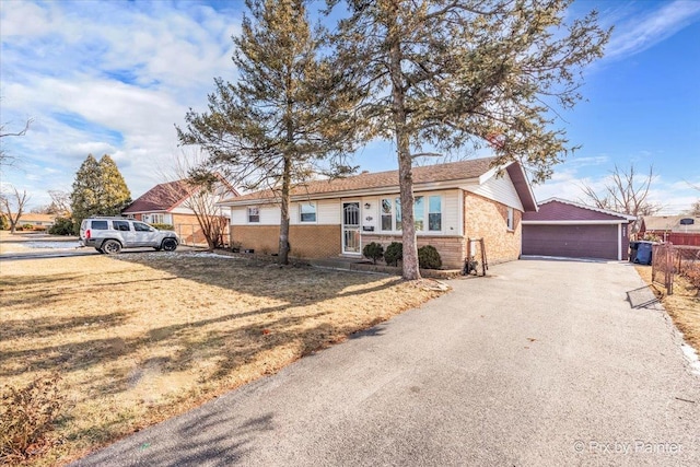 single story home with a garage