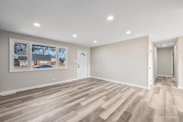 interior space with light hardwood / wood-style floors