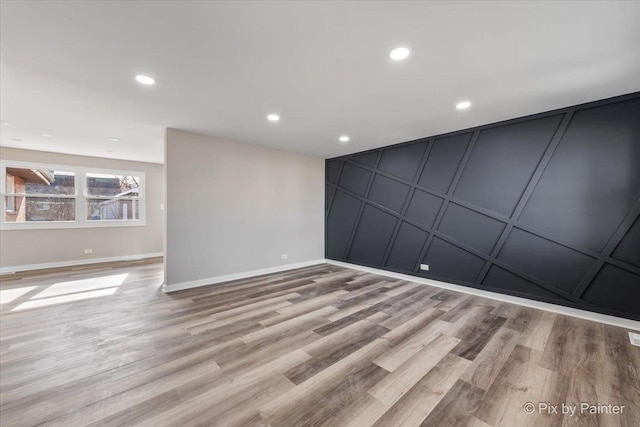 empty room with light wood-type flooring